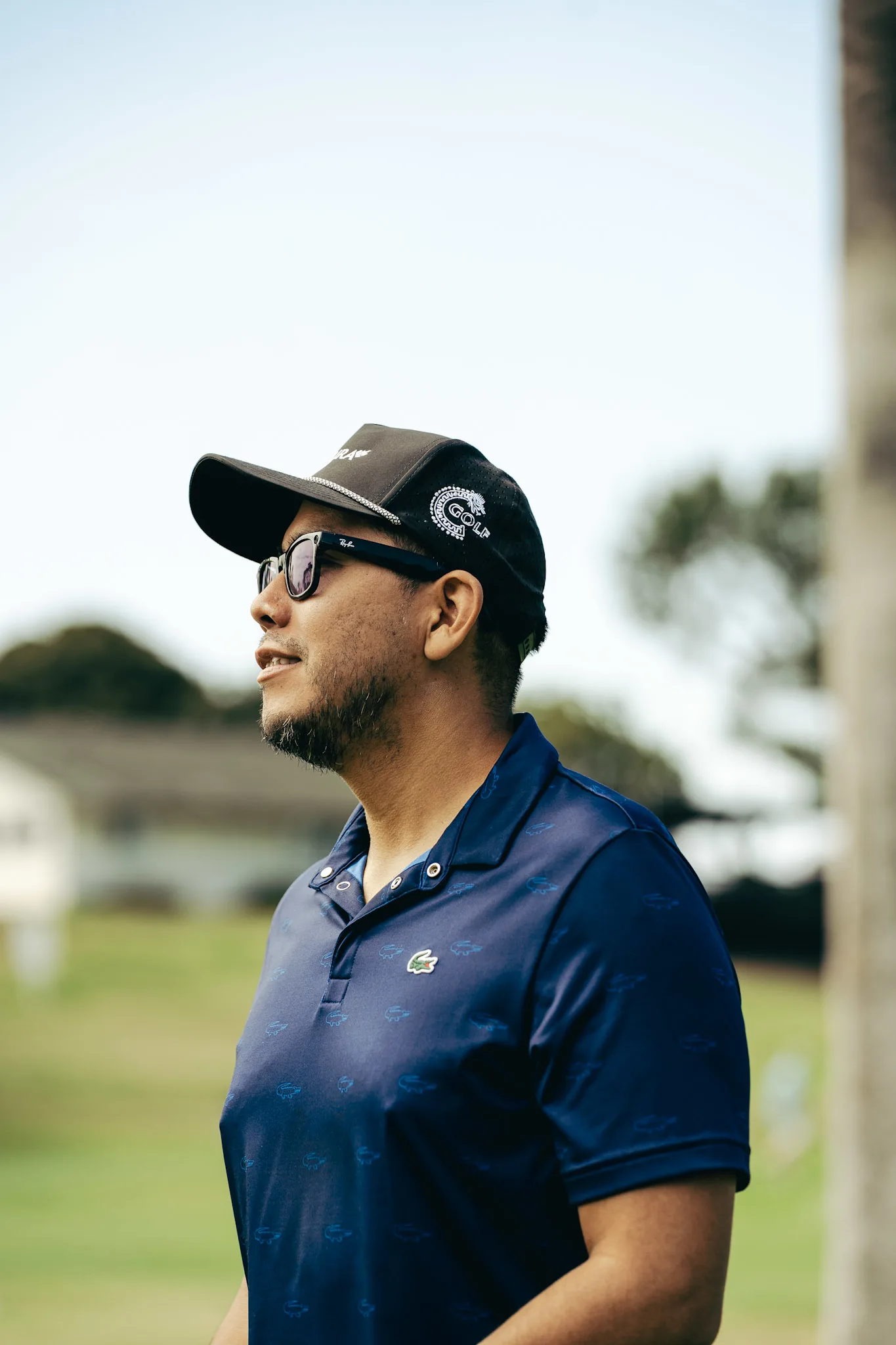 A Cultura Golf member looking to the horizon on the course